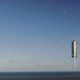 Imagen para el artículo titulado Las surrealistas imágenes de la Starship volando por primera vez sirven como fondo de pantalla